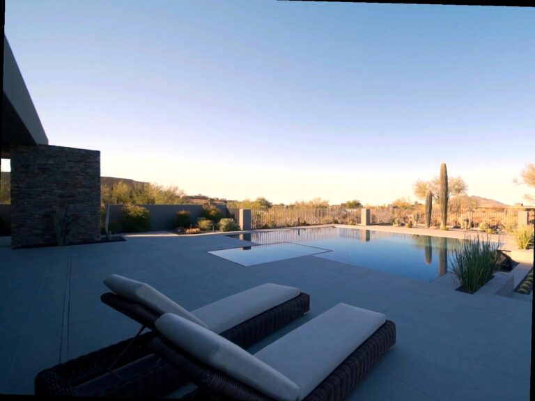 Luxury custom pool and outdoor living design with ramada and desert mountain views in Desert Mountain Scottsdale Arizona