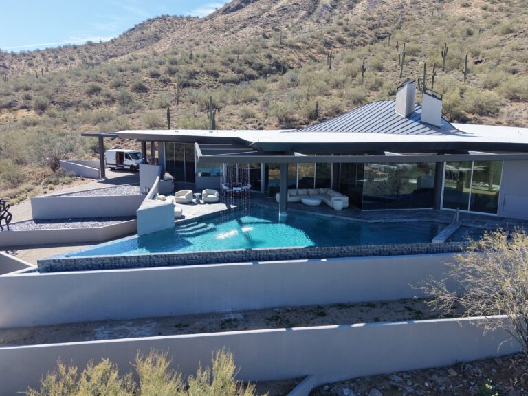 Contemporary Negative edge luxury pool by Scottsdale Pools